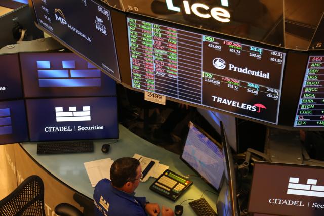 (250717) -- NEW YORK, July 17, 2025 (Xinhua) -- A trader works on the floor of the New York Stock Exchange in New York, the United States, on July 17, 2025. U.S. stocks ended higher on Thursday. The Dow Jones Industrial Average rose 0.52 percent to 44,484.49. The S&P 500 gained 0.54 percent to 6,297.36, while the Nasdaq Composite Index rose 0.75 percent to 20,885.65. (Xinhua/Liu Yanan)