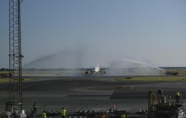 (250718) -- COPENHAGEN, July 18, 2025 (Xinhua) -- A plane of China Eastern Airlines receives a water cannon salute at the Copenhagen Airport, in Copenhagen, Denmark, on July 17, 2025. China Eastern Airlines on Thursday launched a new direct route between China's Shanghai and Denmark's Copenhagen, strengthening air connectivity between the two countries.
   TO GO WITH "China Eastern Airlines launches Shanghai-Copenhagen route" (Xinhua/Zhang Yuliang)