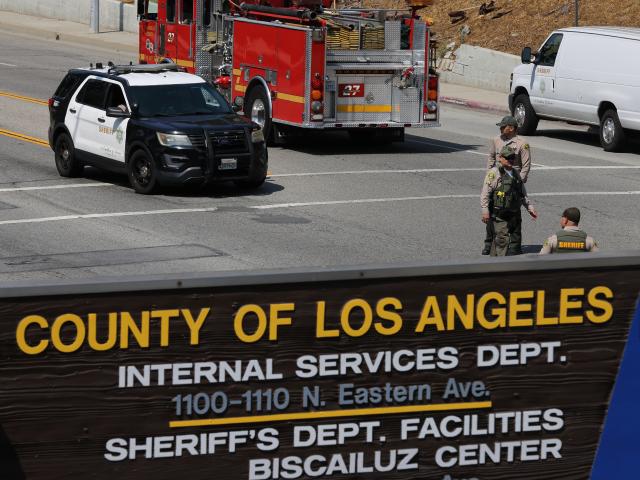 (250718) -- LOS ANGELES, July 18, 2025 (Xinhua) -- Deputies stand guard after an explosion at a training facility of the Los Angeles County Sheriff's Department in Los Angeles County, California, the United States, on July 18, 2025. Three deputies were killed Friday morning in an explosion at a police training facility in Southern California, authorities confirmed. (Photo by Qiu Chen/Xinhua)