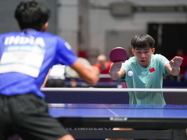 (250719) -- ESSEN, July 19, 2025 (Xinhua) -- Zeng Beixun (R) of China hits a return during the men's team round of 16 match of table tennis between China and India at the Rhine-Ruhr 2025 FISU World University Games in Essen, Germany, July 18, 2025. (Xinhua/Wang Xi)