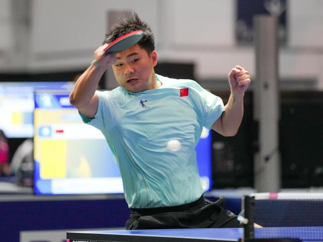 (250719) -- ESSEN, July 19, 2025 (Xinhua) -- Sun Zheng of China hits a return during the men's team round of 16 match of table tennis between China and India at the Rhine-Ruhr 2025 FISU World University Games in Essen, Germany, July 18, 2025. (Xinhua/Wang Xi)