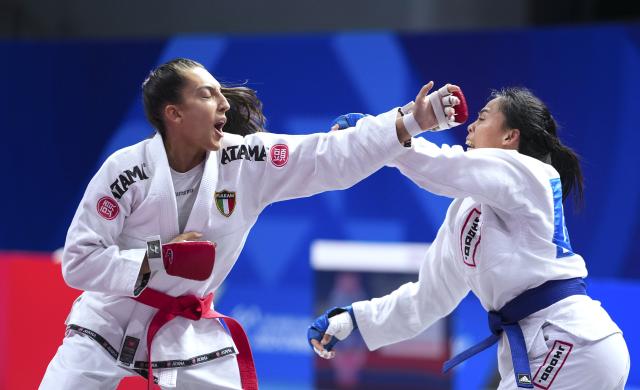 (250811) -- CHENGDU, Aug. 11, 2025 (Xinhua) -- Chiara Fiorelli (L) of Italy competes against Orapa Senatham of Thailand during the Women's -63kg Fighting Finals Gold Medal Match of Ju-Jitsu event at The World Games 2025 in Chengdu, southwest China's Sichuan Province, Aug. 11, 2025. (Xinhua/Jiang Hongjing)