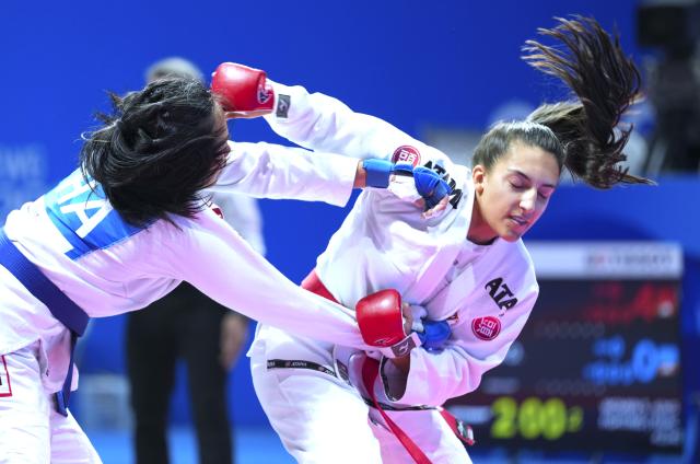 (250811) -- CHENGDU, Aug. 11, 2025 (Xinhua) -- Chiara Fiorelli (R) of Italy competes against Orapa Senatham of Thailand during the Women's -63kg Fighting Finals Gold Medal Match of Ju-Jitsu event at The World Games 2025 in Chengdu, southwest China's Sichuan Province, Aug. 11, 2025. (Xinhua/Jiang Hongjing)