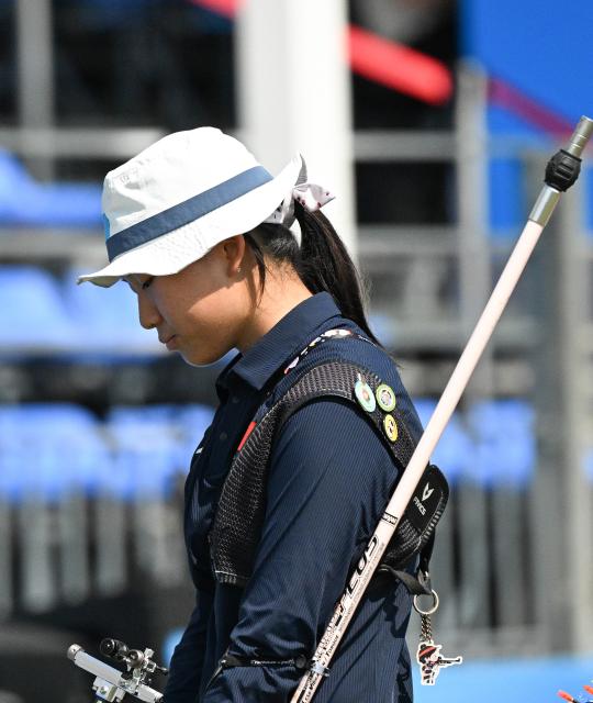 (250812) -- CHENGDU, Aug. 12, 2025 (Xinhua) -- Bao Yuning of China reacts during the Archery Women's Recurve Elimination Group A Match against Eleanor Brug of Canada at The World Games 2025 in Chengdu, southwest China's Sichuan Province, Aug. 12, 2025. (Xinhua/Sun Fanyue)