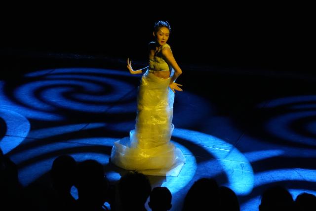 (250812) -- EDINBURGH, Aug. 12, 2025 (Xinhua) -- A dancer from Shanghai Theatre Academy performs dance drama The Pure Blue during Edinburgh Art Festival in Edinburgh, Britain, Aug. 11, 2025. TO GO WITH "China Focus showcases Chinese innovative performing arts at Edinburgh festival" (Xinhua/Zheng Bofei)