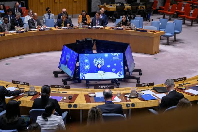 (250917) -- UNITED NATIONS, Sept. 17, 2025 (Xinhua) -- Roza Otunbayeva, the UN secretary-general's special representative for Afghanistan (on screens) speaks via a video link at a Security Council meeting at the UN headquarters in New York, Sept. 17, 2025. Otunbayeva on Wednesday called for the international community's continued engagement with the war-torn country. (Loey Felipe/UN Photo/Handout via Xinhua)
