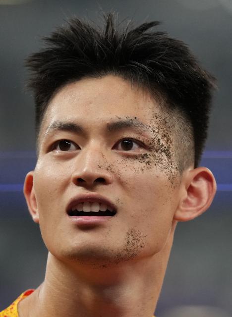 (250918) -- TOKYO, Sept. 18, 2025 (Xinhua) -- Zhang Mingkun of China reacts during the men's long jump final at the 2025 World Athletics Championships in Tokyo, Japan, Sept. 17, 2025. (Xinhua/Lui Siu Wai)