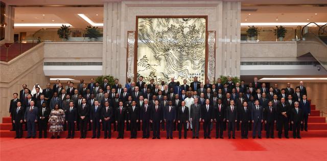 (250917) -- NANJING, Sept. 17, 2025 (Xinhua) -- Chinese State Councilor and Minister of Public Security Wang Xiaohong poses for a group photo with guests prior to the opening ceremony of the 2025 Conference of Global Public Security Cooperation Forum in Lianyungang, east China's Jiangsu Province, Sept. 17, 2025. Wang attended the conference and delivered a speech here on Wednesday. (Photo by Liu Zhenrui/Xinhua)