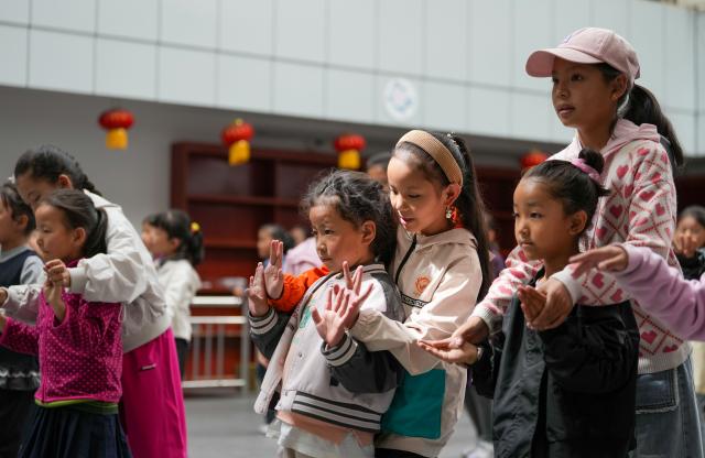 (250918) -- LHASA, Sept. 18, 2025 (Xinhua) -- Children practice Tibetan opera at a public art center in Lhasa, southwest China's Xizang Autonomous Region, Sept. 14, 2025.
  Considered a living fossil of Tibetan culture, Tibetan opera blends talking, singing, acting, dancing and literature. It was included in the UNESCO Representative List of the Intangible Cultural Heritage of Humanity in 2009.
  With the government's support and the dedication of both young and old Tibetan opera enthusiasts, along with the efforts of intangible cultural heritage inheritors, this traditional art form is gaining new momentum on the plateau. (Xinhua/Jigme Dorje)