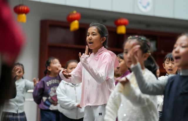 (250918) -- LHASA, Sept. 18, 2025 (Xinhua) -- Children learn Tibetan opera at a public art center in Lhasa, southwest China's Xizang Autonomous Region, Sept. 14, 2025.
  Considered a living fossil of Tibetan culture, Tibetan opera blends talking, singing, acting, dancing and literature. It was included in the UNESCO Representative List of the Intangible Cultural Heritage of Humanity in 2009.
  With the government's support and the dedication of both young and old Tibetan opera enthusiasts, along with the efforts of intangible cultural heritage inheritors, this traditional art form is gaining new momentum on the plateau. (Xinhua/Jigme Dorje)