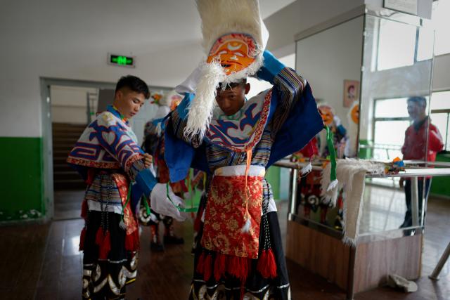 (250918) -- LHASA, Sept. 18, 2025 (Xinhua) -- Students put on Tibetan opera costumes at Lhasa No. 2 secondary vocational and technical school in Lhasa, southwest China's Xizang Autonomous Region, Sept. 9, 2025.
  Considered a living fossil of Tibetan culture, Tibetan opera blends talking, singing, acting, dancing and literature. It was included in the UNESCO Representative List of the Intangible Cultural Heritage of Humanity in 2009.
  With the government's support and the dedication of both young and old Tibetan opera enthusiasts, along with the efforts of intangible cultural heritage inheritors, this traditional art form is gaining new momentum on the plateau. (Xinhua/Zhang Xiaoyu)