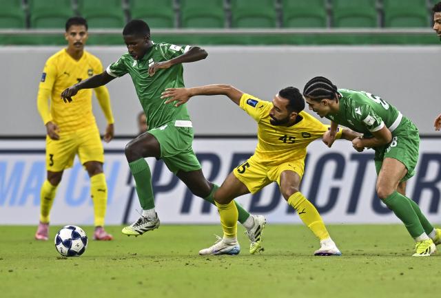 (250918) -- DOHA, Sept. 18, 2025 (Xinhua) -- Amidou Doumbouya (2nd L) of Al Ahli vies with Mahdi Abduljabbar Hasan (2nd R) of Al Khaldiya during the group B match between Qatar's Al Ahli SC and Bahrain's Al Khaldiya SC of AFC Champions League Two in Doha, Qatar, Sept. 17, 2025. (Photo by Nikku/Xinhua)