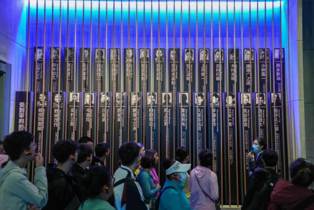 (250918) -- HARBIN, Sept. 18, 2025 (Xinhua) -- People visit the Exhibition Hall of Evidence of Crimes Committed by Unit 731 of the Japanese Imperial Army in Harbin, capital of northeast China's Heilongjiang Province, Sept. 18, 2025. "The real history is far more brutal than what the film can depict," said Jin Chengmin, curator of the Exhibition Hall of Evidence of Crime Committed by Unit 731 of the Japanese Imperial Army.
  Unit 731, a top-secret biological and chemical warfare research base, was established in the Pingfang District of Harbin, and served as the nerve center for Japanese biological warfare in China and Southeast Asia during World War II.
   Historical records suggest that between 1940 and 1945, at least 3,000 people were used in human experiments by Unit 731, while more than 300,000 people in China were killed by Japan's biological weapons. (Xinhua/Wang Jianwei)