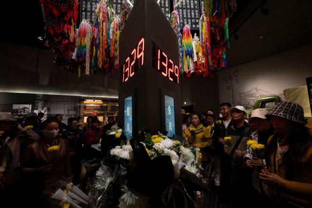(250918) -- HARBIN, Sept. 18, 2025 (Xinhua) -- Visitors lay flowers to victims of crimes committed by Unit 731 at the Exhibition Hall of Evidence of Crimes Committed by Unit 731 of the Japanese Imperial Army in Harbin, capital of northeast China's Heilongjiang Province, Sept. 18, 2025. "The real history is far more brutal than what the film can depict," said Jin Chengmin, curator of the Exhibition Hall of Evidence of Crime Committed by Unit 731 of the Japanese Imperial Army.
  Unit 731, a top-secret biological and chemical warfare research base, was established in the Pingfang District of Harbin, and served as the nerve center for Japanese biological warfare in China and Southeast Asia during World War II.
   Historical records suggest that between 1940 and 1945, at least 3,000 people were used in human experiments by Unit 731, while more than 300,000 people in China were killed by Japan's biological weapons. (Xinhua/Zhang Tao)