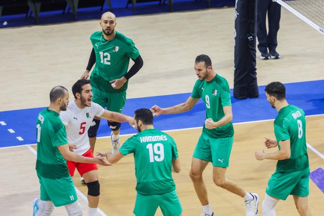 (250918) -- QUEZON CITY, Sept. 18, 2025 (Xinhua) -- Players of Algeria celebrate after scoring a point during the pool F match between Belgium and Algeria at the FIVB Men's World Championship 2025 in Quezon City, the Philippines, on Sept. 18, 2025. (Xinhua/Rouelle Umali)