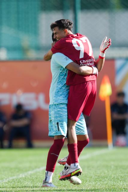 (250918) -- DALIAN, Sept. 18, 2025 (Xinhua) -- Kably Haitam of University Chouaib Doukkali (R) celebrates with a teammate after scoring during the Men's Group D match between University Chouaib Doukkali (MAR) and Yanbian University (CHN) at 2025 FISU University World Cup Football in Dalian, northeast China's Liaoning Province, on Sept. 18, 2025. (Xinhua/Zheng Huansong)