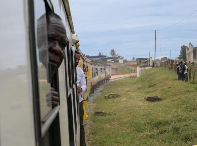 (250918) -- MOMBASA, Sept. 18, 2025 (Xinhua) -- People take a meter-gauge commuter train in Mombasa, Kenya, on Sept. 17, 2025. Kenyan President William Ruto on Wednesday commissioned the Mombasa commuter railway service that will link downtown sections of the port city to a Standard Gauge Railway (SGR) terminus, which will ease the mobility of passengers and goods.
   TO GO WITH "Kenya commissions commuter rail service to ease mobility in port city of Mombasa" (Xinhua/Yang Guang)