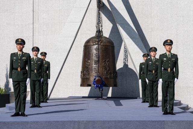 (250918) -- SHENYANG, Sept. 18, 2025 (Xinhua) -- A ceremony to commemorate the September 18 Incident is held at the 9.18 Historical Museum in Shenyang, northeast China's Liaoning Province, Sept. 18, 2025. (Xinhua/Pan Yulong)