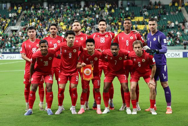 (250918) -- BEIJING, Sept. 18, 2025 (Xinhua) -- Starting players of Cong An Ha Noi FC pose for photos before the Pool E match between Beijing Guoan of China and Cong An Ha Noi FC of Vietnam at the AFC Champions League Two in Beijing, capital of China, Sept. 18, 2025. (Xinhua/Wang Kaiyan)