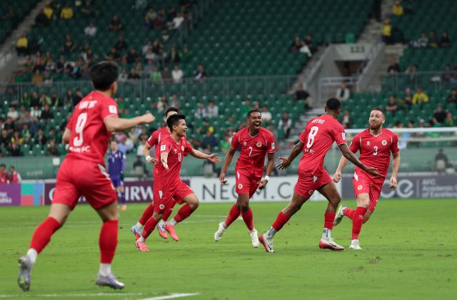 (250918) -- BEIJING, Sept. 18, 2025 (Xinhua) -- Players of Cong An Ha Noi FC celebrate scoring during the Pool E match between Beijing Guoan of China and Cong An Ha Noi FC of Vietnam at the AFC Champions League Two in Beijing, capital of China, Sept. 18, 2025. (Xinhua/Hu Xingyu)
