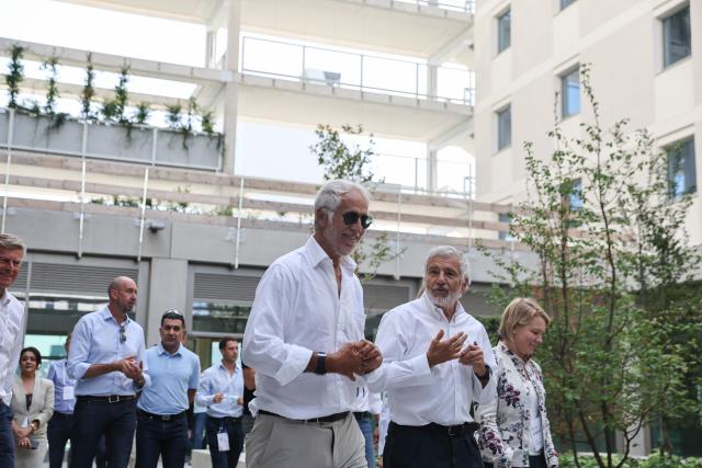 (250918) -- MILAN, Sept. 18, 2025 (Xinhua) -- Giovanni Malago (C), President of the Milano Cortina 2026 Organizing Committee, visits the Milano Cortina 2026 Olympic and Paralympic Village in Milan, Italy, Sept. 18, 2025. (Xinhua/Li Jing)