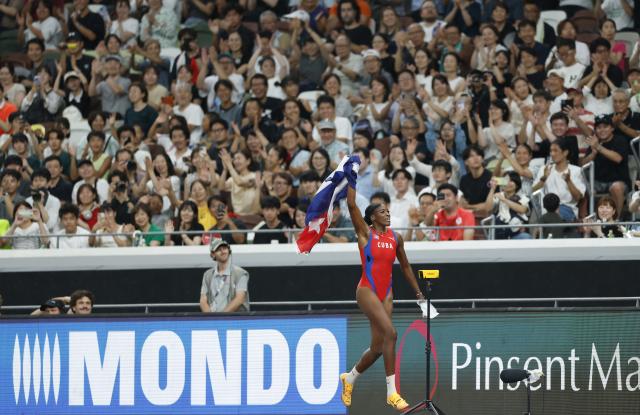 (250918) -- TOKYO, Sept. 18, 2025 (Xinhua) -- Leyanis Perez Hernandez of Cuba celebrates after the women's triple jump final at the 2025 World Athletics Championships in Tokyo, Japan, Sept. 18, 2025. (Xinhua/Wang Lili)