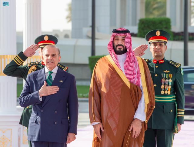 (250918) -- RIYADH, Sept. 18, 2025 (Xinhua) -- Saudi Crown Prince and Prime Minister Mohammed bin Salman Al Saud (R, front) meets with visiting Pakistani Prime Minister Shehbaz Sharif in Riyadh, Saudi Arabia, Sept. 17, 2025. Saudi Arabia and Pakistan signed a mutual defense agreement on Wednesday in the Saudi capital Riyadh, under which any attack against either country will be considered "an aggression against both," the Saudi Press Agency reported. (SPA/Handout via Xinhua)