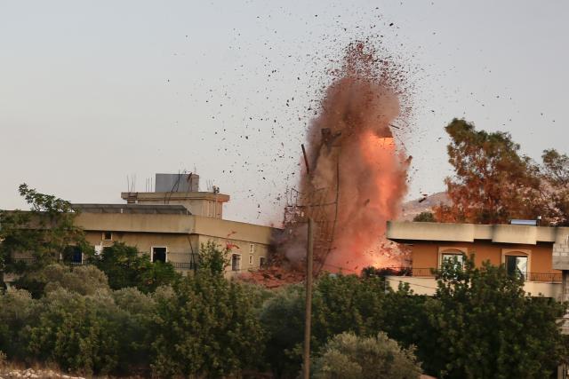 (250918) -- KFAR TEBNIT (LEBANON), Sept. 18, 2025 (Xinhua) -- Photo taken on Sept. 18, 2025, shows an Israeli airstrike hitting a house in the center of Kfar Tebnit, near Nabatieh in southern Lebanon. The Israeli army carried out several airstrikes Thursday evening across southern Lebanon, targeting villages including Mays el Jabal, Dibbine, and Kfar Tebnit, the National News Agency (NNA) reported. (Photo by Ali Hashisho/Xinhua)