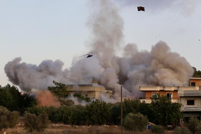 (250918) -- KFAR TEBNIT (LEBANON), Sept. 18, 2025 (Xinhua) -- Photo taken on Sept. 18, 2025, shows an Israeli airstrike hitting a house in the center of Kfar Tebnit, near Nabatieh in southern Lebanon. The Israeli army carried out several airstrikes Thursday evening across southern Lebanon, targeting villages including Mays el Jabal, Dibbine, and Kfar Tebnit, the National News Agency (NNA) reported. (Photo by Ali Hashisho/Xinhua)