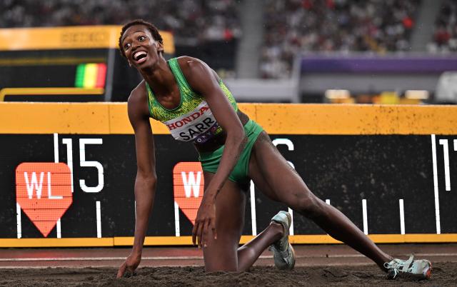 (250919) -- TOKYO, Sept. 19, 2025 (Xinhua) -- Saly Sarr of Senegal reacts during the women's triple jump final at the 2025 World Athletics Championships in Tokyo, Japan, Sept. 18, 2025. (Xinhua/Song Yanhua)