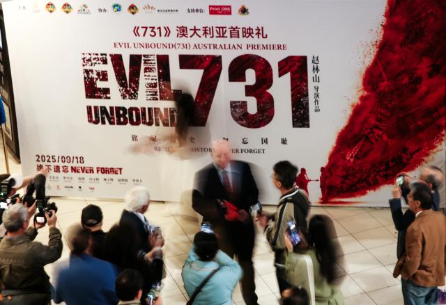 (250919) -- BEIJING, Sept. 19, 2025 (Xinhua) -- Spectators attend the Australian premiere of the film "Evil Unbound" at a cinema in Sydney, Australia, Sept. 18, 2025.
  "Evil Unbound," a film depicting the atrocities of Japan's notorious Unit 731 clandestinely operated by the Japanese Imperial Army during World War II, was officially released in Australia on Thursday.
  The release day of the film coincided with the 94th anniversary of the September 18 Incident that marked the start of the Chinese People's War of Resistance against Japanese Aggression. This year also marks the 80th anniversary of the victory in China's war of resistance and the World Anti-Fascist War. (Xinhua/Ma Ping)