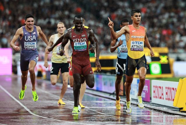 (250919) -- TOKYO, Sept. 19, 2025 (Xinhua) -- Emmanuel Wanyonyi (front L) of Kenya and Mohamed Attaoui (front R) of Spain cross the finish line during the men's 800m semifinal at the 2025 World Athletics Championships in Tokyo, Japan, Sept. 18, 2025. (Xinhua/Jiang Han)
