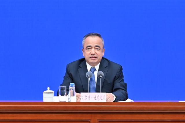 (250919) -- BEIJING, Sept. 19, 2025 (Xinhua) -- Erkin Tuniyaz, chairman of the regional government of Xinjiang, speaks at a press conference held by the State Council Information Office (SCIO) on the white paper titled "CPC Guidelines for Governing Xinjiang in the New Era: Practice and Achievements" in Beijing, capital of China, Sept. 19, 2025. (Xinhua/Li Xin)