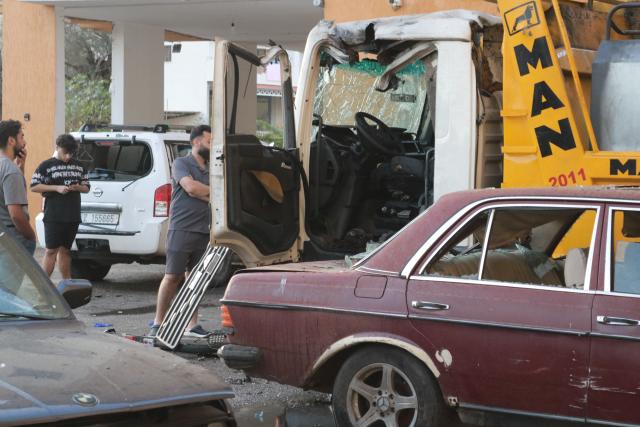 (250929)-- NABATIEH (LEBANON), Sept. 29, 2025 (Xinhua) -- Photo taken on Sept. 29, 2025 shows a water transport tanker hit by an Israeli drone in Nabatieh, southern Lebanon, killing a Hezbollah member. Two people were killed and another was injured on Monday in Israeli airstrikes on southern and eastern Lebanon, according to Lebanon's National News Agency (NNA) and security sources. (Photo by Taher Abu Hamdan /Xinhua)