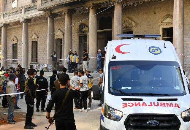 (251002) -- DAMASCUS, Oct. 2, 2025 (Xinhua) -- An ambulance and civil defense personnel are seen outside a historical building which is also the former site of Syria's Interior Ministry after part of its ceiling collapsed during renovation at Marjeh Square, central Damascus, Syria, Oct. 1, 2025. (Photo by Ammar Safarjalani/Xinhua)