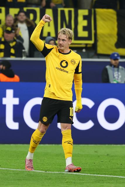 (251002) -- DORTMUND, Oct. 2, 2025 (Xinhua) -- Julian Brandt of Borussia Dortmund celebrates scoring during the UEFA Champions League group stage 2nd round match between Borussia Dortmund and Athletic Club in Dortmund, Germany, Oct. 1, 2025. (Photo by Joachim Bywaletz/Xinhua)
