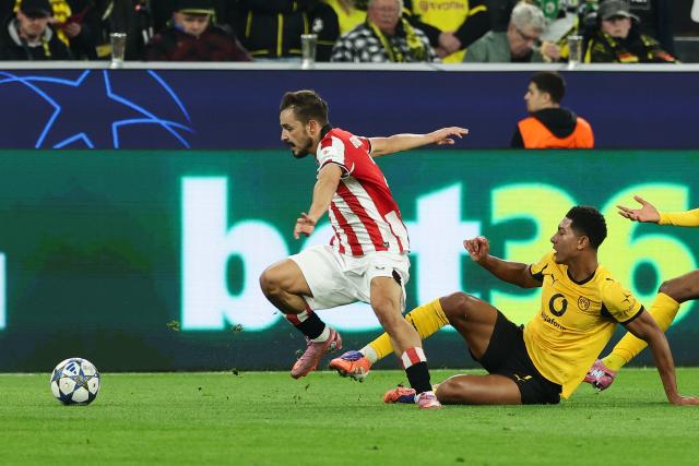 (251002) -- DORTMUND, Oct. 2, 2025 (Xinhua) -- Jobe Bellingham (R) of Borussia Dortmund vies with Andoni Gorosabel of Athletic Club during the UEFA Champions League group stage 2nd round match between Borussia Dortmund and Athletic Club in Dortmund, Germany, Oct. 1, 2025. (Photo by Joachim Bywaletz/Xinhua)
