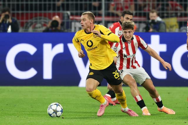 (251002) -- DORTMUND, Oct. 2, 2025 (Xinhua) -- Julian Ryerson (L) of Borussia Dortmund competes during the UEFA Champions League group stage 2nd round match between Borussia Dortmund and Athletic Club in Dortmund, Germany, Oct. 1, 2025. (Photo by Joachim Bywaletz/Xinhua)