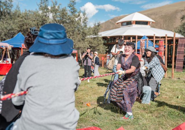 (251002) -- LHASA, Oct. 2, 2025 (Xinhua) -- Local residents and tourists take part in a tug-of-war game at a "Lingka" festival in Qonggyai County of Shannan, southwest China's Xizang Autonomous Region, on Sept. 13, 2025. "Lingka" means "garden" in the Tibetan language. In Xizang, people follow a tradition of spending the "Lingka" time during which they camp out and have picnics in parks or suburbs. 
    Nowadays, this traditional folk custom has developed into a new form of cultural tourism as well as a vibrant lifestyle. (Xinhua/Tenzin Nyida)