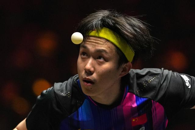 (251002) -- BEIJING, Oct. 2, 2025 (Xinhua) -- Wang Chuqin of China serves to An Jaehyun of South Korea during the men's singles round of 16 match at 2025 World Table Tennis (WTT) China Smash in Beijing, China, Oct. 2, 2025. (Xinhua/Ju Huanzong)