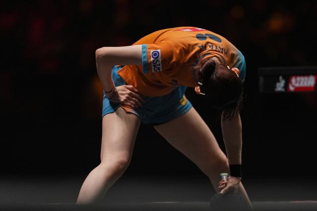 (251002) -- BEIJING, Oct. 2, 2025 (Xinhua) -- Hayata Hina of Japan reacts during the women's singles round of 16 match against Wang Manyu of China at 2025 World Table Tennis (WTT) China Smash in Beijing, China, Oct. 2, 2025. (Xinhua/Ju Huanzong)