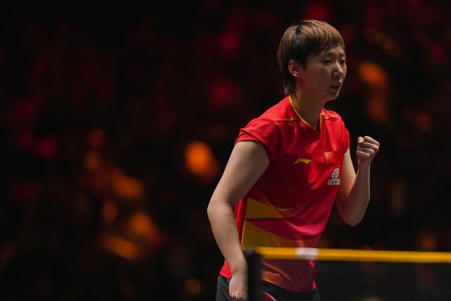 (251002) -- BEIJING, Oct. 2, 2025 (Xinhua) -- Wang Manyu of China celebrates a point during the women's singles round of 16 match against Hayata Hina of Japan at 2025 World Table Tennis (WTT) China Smash in Beijing, China, Oct. 2, 2025. (Xinhua/Ju Huanzong)