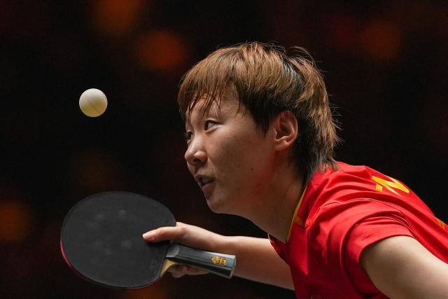(251002) -- BEIJING, Oct. 2, 2025 (Xinhua) -- Wang Manyu of China serves during the women's singles round of 16 match against Hayata Hina of Japan at 2025 World Table Tennis (WTT) China Smash in Beijing, China, Oct. 2, 2025. (Xinhua/Ju Huanzong)
