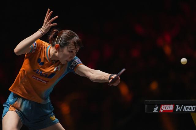 (251002) -- BEIJING, Oct. 2, 2025 (Xinhua) -- Hayata Hina of Japan hits a return during the women's singles round of 16 match against Wang Manyu of China at 2025 World Table Tennis (WTT) China Smash in Beijing, China, Oct. 2, 2025. (Xinhua/Ju Huanzong)
