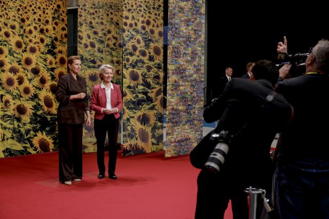 (251002) -- COPENHAGEN, Oct. 2, 2025 (Xinhua) -- European Commission President Ursula von der Leyen (2nd, L) poses for a group photo with Danish Prime Minister Mette Frederiksen (1st, L) during the seventh meeting of the European Political Community (EPC) in Copenhagen, capital of Denmark, Oct. 2, 2025. TO GO WITH "EPC summit highlights divisions over Ukraine's EU membership" (Photo by Anders Kongshaug/Xinhua)