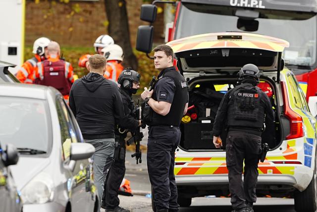 (251002) -- MANCHESTER(BRITAIN), Oct. 2, 2025 (Xinhua) -- Police officers and emergency workers are pictured on the scene at Heaton Park Hebrew Congregation Synagogue in Manchester, Britain, Oct. 2, 2025. Police confirmed Thursday afternoon that the attack outside the Heaton Park Hebrew Congregation Synagogue on Middleton Road in Crumpsall, Manchester, has been declared a terrorist incident. (Xinhua)