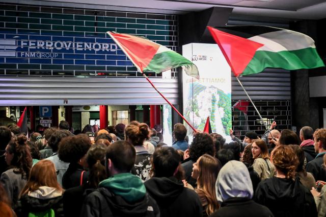 (251002) -- MILAN, Oct. 2, 2025 (Xinhua) -- Protesters gather for a demonstration at Cadorna Train Station in Milan, Italy, Oct. 1, 2025. TO GO WITH "Roundup: European countries condemn Israeli interception of Gaza-bound flotilla, demand safety of citizens" (Str/Xinhua)