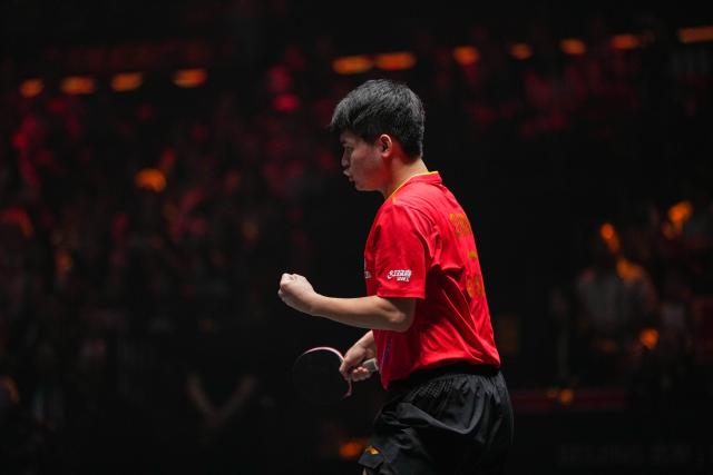 (251003) -- BEIJING, Oct. 3, 2025 (Xinhua) -- Lin Shidong celebrates scoring during the men's singles quarterfinal match between Lin Shidong of China and Uda Yukiya of Japan at 2025 World Table Tennis (WTT) China Smash in Beijing, China, Oct. 3, 2025. (Xinhua/Ju Huanzong)