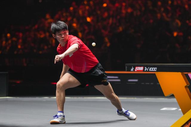 (251003) -- BEIJING, Oct. 3, 2025 (Xinhua) -- Lin Shidong hits a return during the men's singles quarterfinal match between Lin Shidong of China and Uda Yukiya of Japan at 2025 World Table Tennis (WTT) China Smash in Beijing, China, Oct. 3, 2025. (Xinhua/Ju Huanzong)