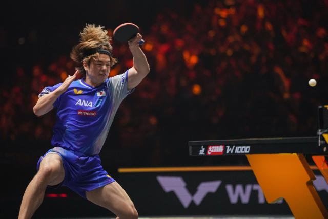 (251003) -- BEIJING, Oct. 3, 2025 (Xinhua) -- Uda Yukiya hits a return during the men's singles quarterfinal match between Lin Shidong of China and Uda Yukiya of Japan at 2025 World Table Tennis (WTT) China Smash in Beijing, China, Oct. 3, 2025. (Xinhua/Ju Huanzong)